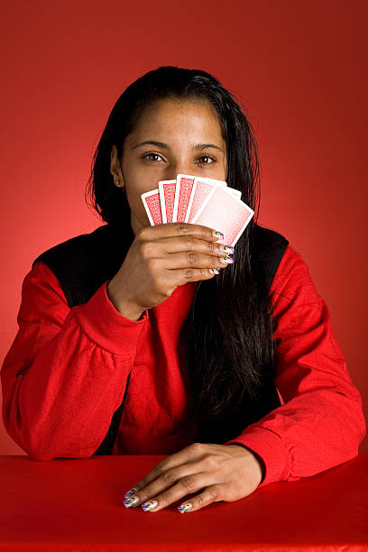 Woman Playing Cards stock photo