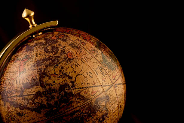 istock A closeup of an old style globe with a black background 93045992