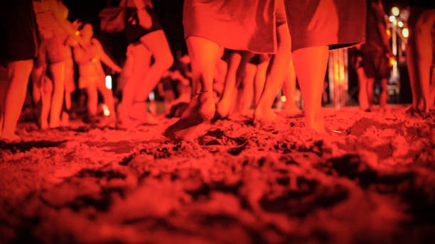 istock Feet dancing at night concert beach party 930467864