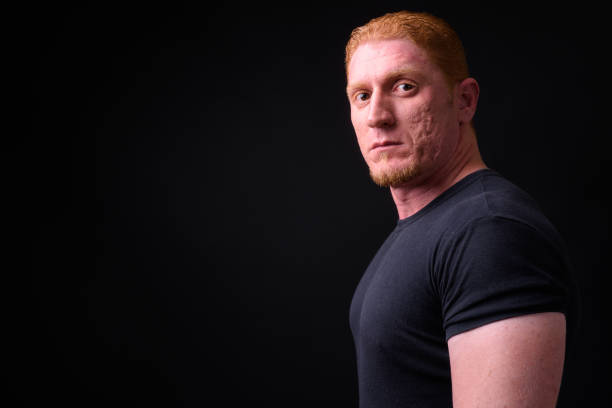 istock Muscular Man With Orange Hair 930470982