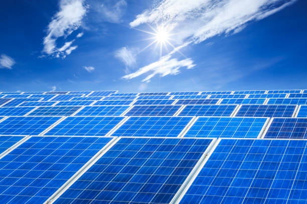 istock solar panels and sky background,green energy 930471514