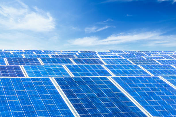 istock solar panels and sky background,green energy 930471576