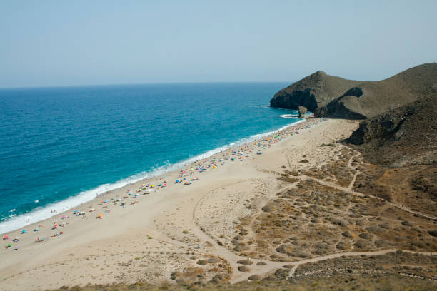 istock Scenic volcanic beach in mediterranean sea. 930471590