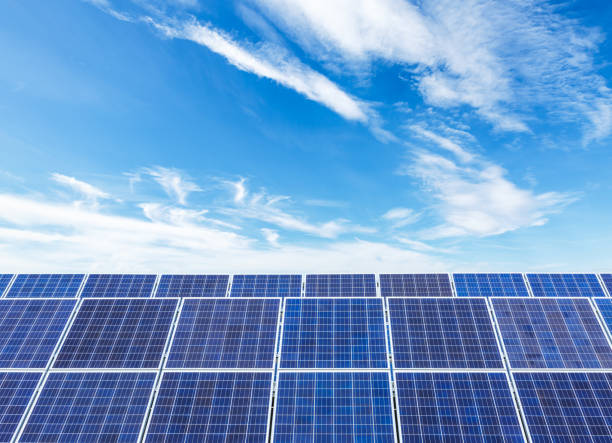 istock solar panels and sky background,green energy 930471930