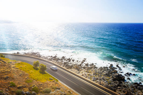 istock Curved road along the coast at Crete, Greece 930476840