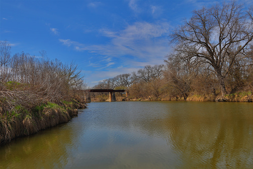 A railroad bridge over the Bosque River near Waco Texas