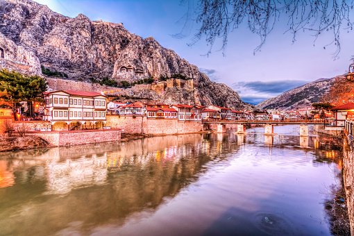 Amasya, Turkey - February 11, 2017 : Old Ottoman houses panoramic view by the Yesilirmak River in Amasya City. Amasya is populer tourist destination in Turkey.