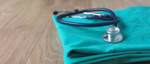 istock A stethoscope shaping a heart on a medical uniform, closeup 930484530