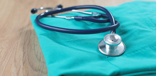 istock A stethoscope shaping a heart on a medical uniform, closeup 930484546