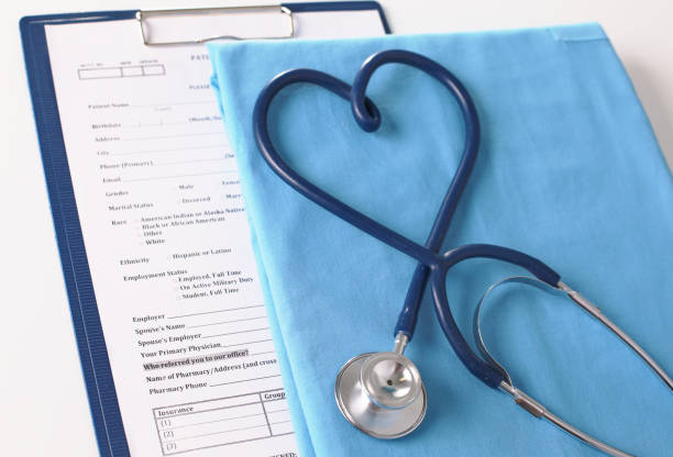 istock A stethoscope shaping a heart on a medical uniform, closeup 930487476