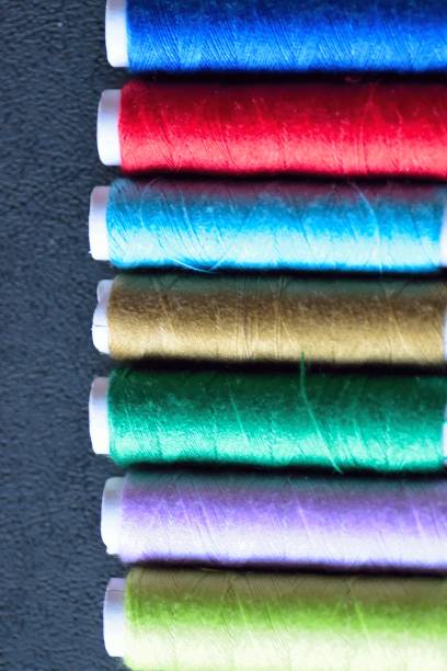istock Macro background texture of colorful sewing threads 930489076