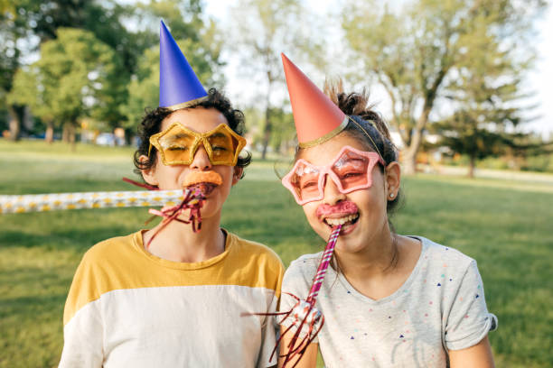 istock Kids having fun on birthday party 930495032