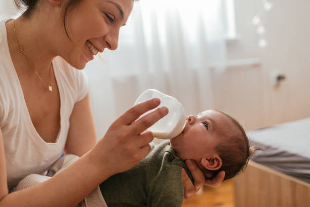 istock Mommy feeding her newborn baby 930504706