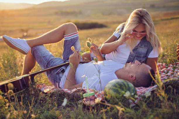 istock Beautiful young couple in nature 930505010