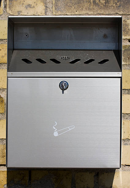 istock Outdoor ashtray on brick wall. 93050648