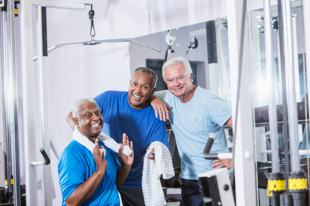 istock Three senior multi-ethnic men working out at gym 930515170