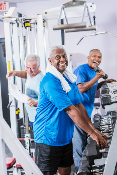 istock Three senior multi-ethnic men working out at gym 930515324