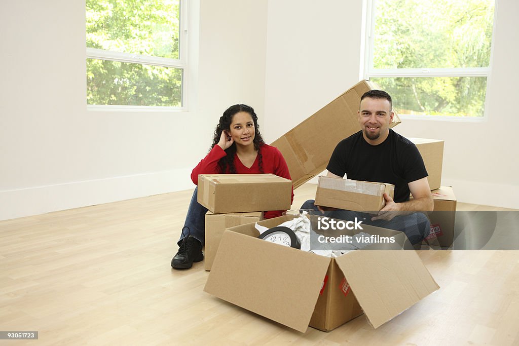 Couple moving in to new home  Adult Stock Photo