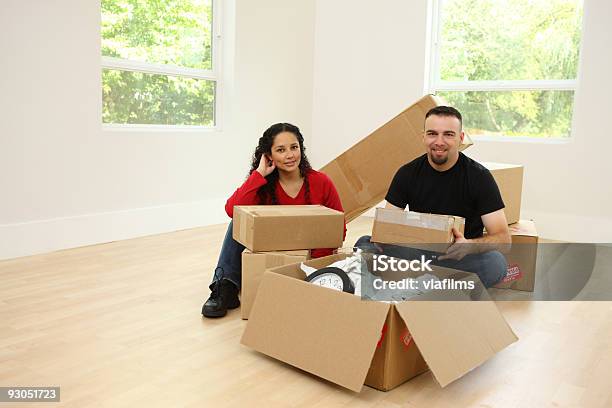 Couple Moving In To New Home Stock Photo - Download Image Now - Adult, Adults Only, Apartment