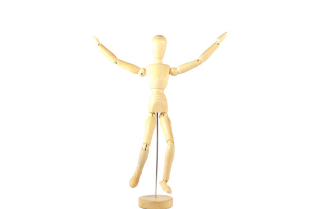istock Robot wood Toys Yellow and white background 930517868