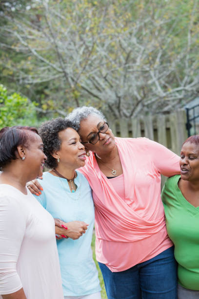 istock Four African-American women standing outdoors together 930518000