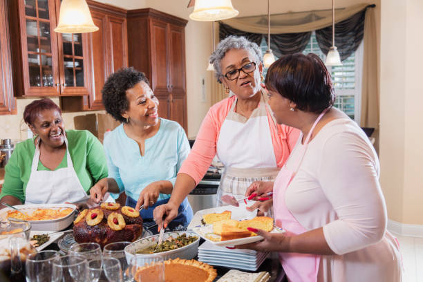 istock African-American women serving home cooked meal 930518434
