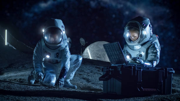 istock Two Astronauts Collect Rock and Soil Samples on the Alien Planet. Space Travel and Exploration, Finding Habitable Planet, Colonization Concept. 930523246