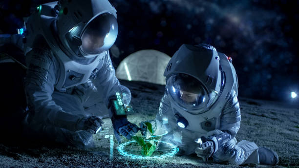 istock Two Astronauts Analyzing Plant Life Found on Alien Planet. Infographics Show Animated Data about Oxygen Generation, DNA and Molecular Structure. Technological Advance and Space Exploration. 930523334