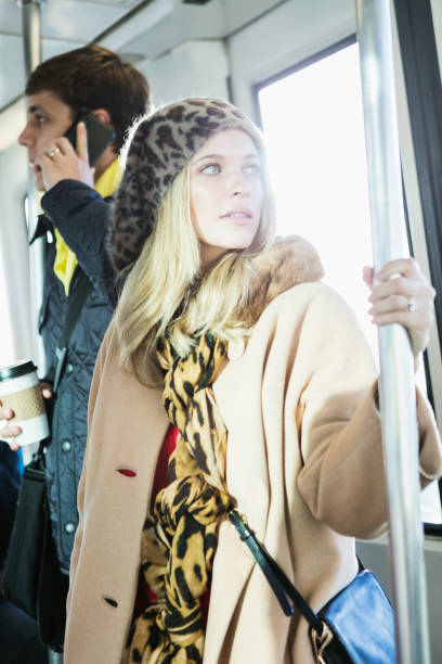istock Young woman riding train 930526304