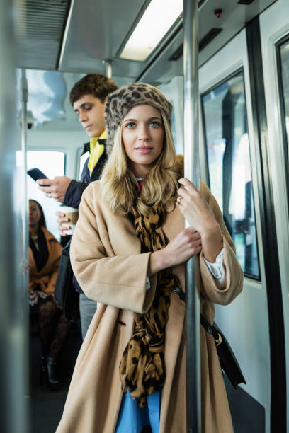istock Young woman riding train 930526522