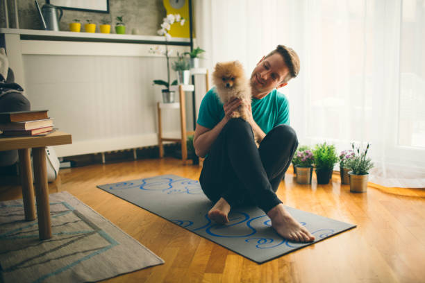istock Mid Adult Man And His Dog 930530792