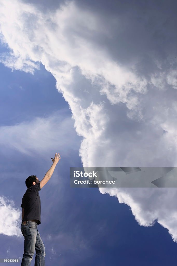 Reaching for clouds  Achievement Stock Photo