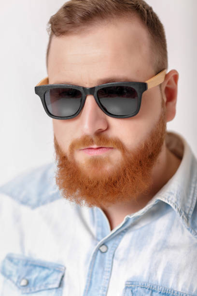 istock beard man in sunglasses and denim shirt 930538656