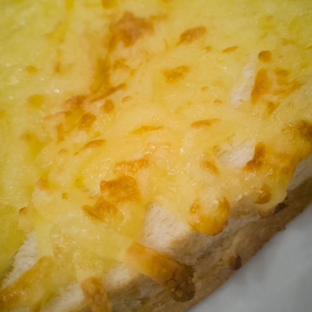 istock Closeup Ham cheese sandwich as background 930539274