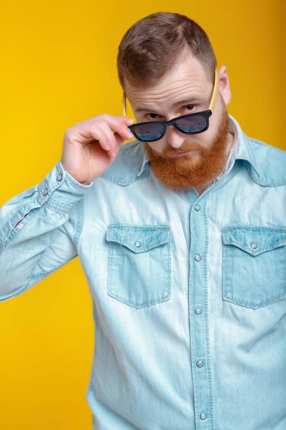 istock beard man in sunglasses and denim shirt 930539704