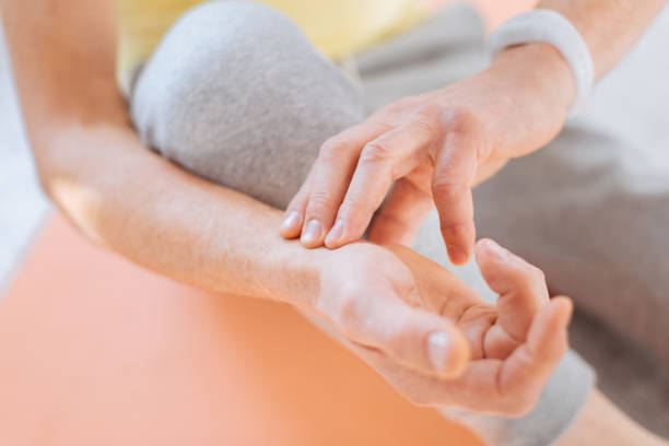 istock Male hands figuring out hear rate 930545662