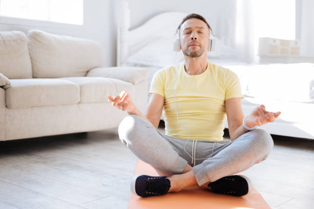 istock Calm collected man listening to music 930545726