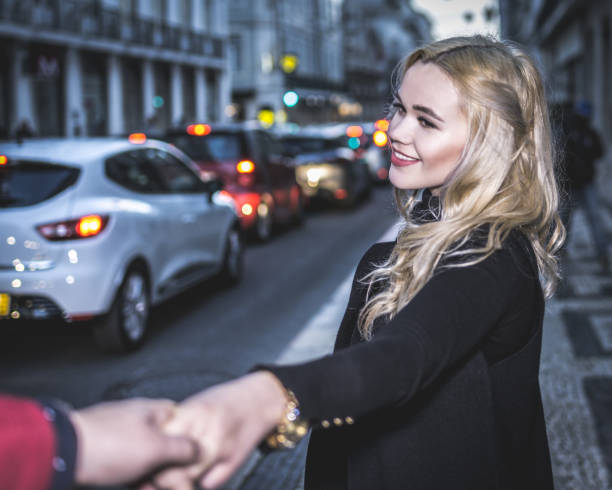 istock Couple Holding hands on the street 930546342