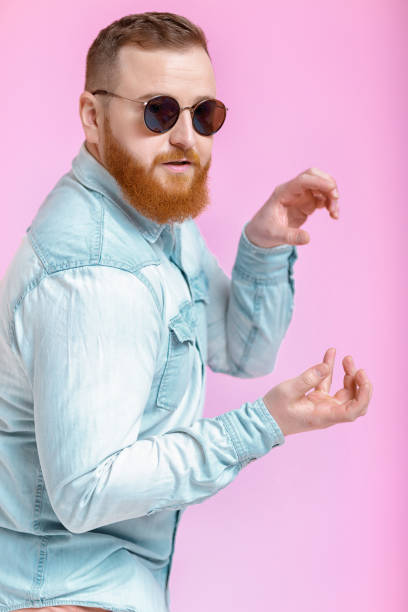 istock beard man in sunglasses and denim shirt 930546998