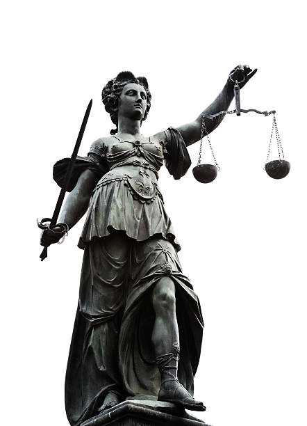 istock Justice statue with balance scales and a sword 93054739