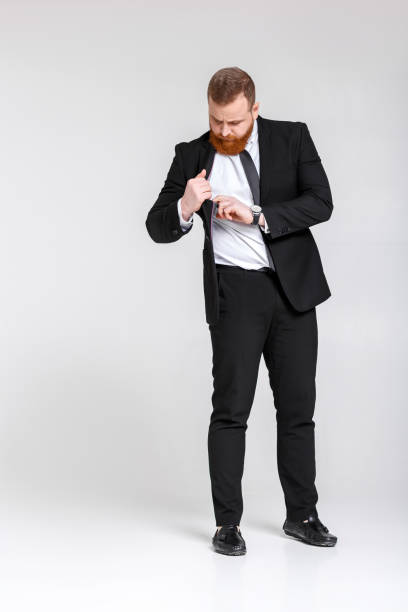 istock man getting dollar banknotes out of pocket 930549174