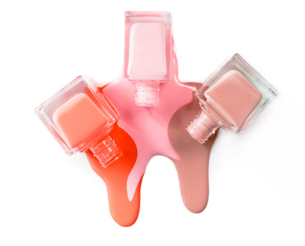 istock 3 color nail Polish isolated on white background 930552866