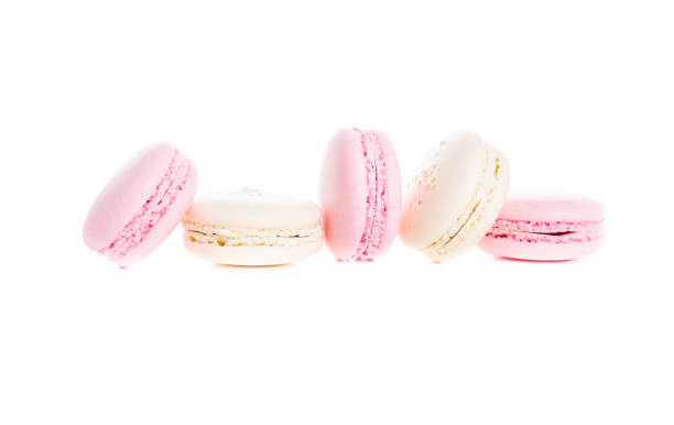istock Exquisite french dessert, pink and cream macaron cakes 930555128