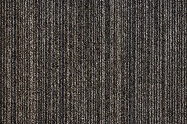 Photo of Texture of floor covering carpet, brown