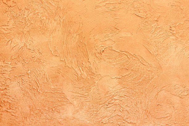 istock Beautiful textured wall of yellow color 930564362