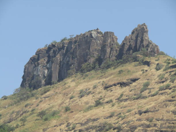istock India landscape with rocks and rolling hills. 930564544