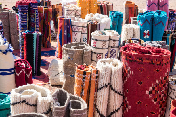 Colorful rugs and carpets in street market stock photo