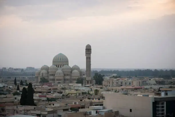 View of the Grand Mosque of Mosul, Iraq at dusk on May 23, 2017