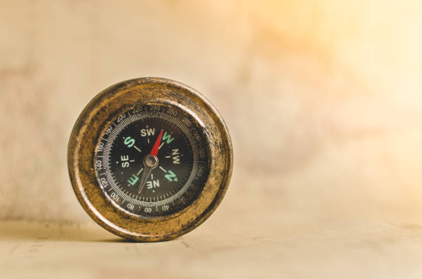 istock Compass on the background of old maps 930571090