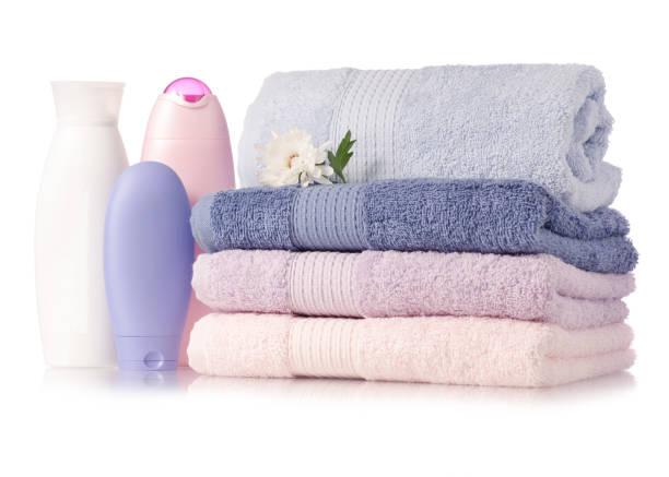 istock A stack set towels plastic bottle with cosmetic  cream lotion gel for body flower 930571214